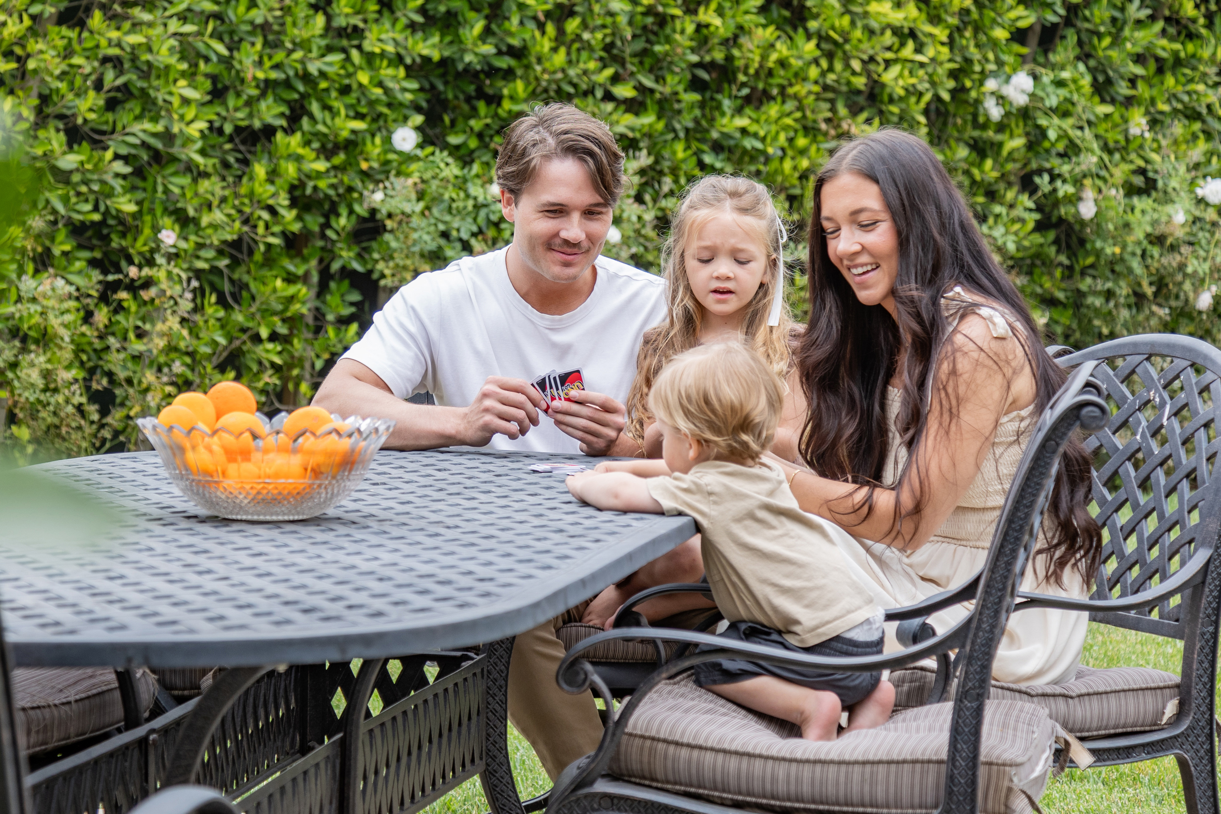 Family enjoying pest-free backyard